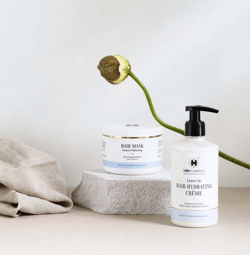 Lifestyle shot of Harklinikken Products with flower